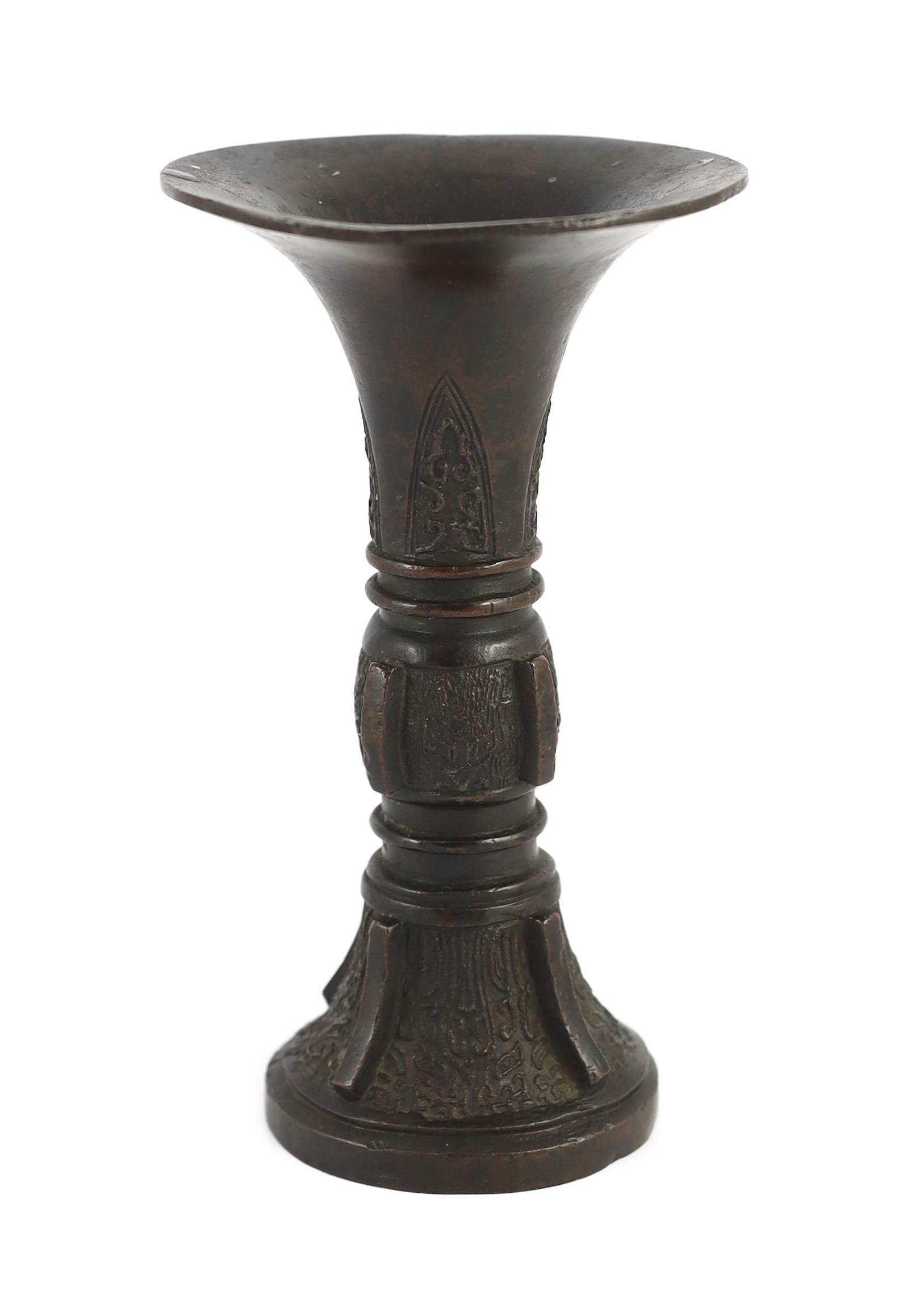 A Chinese archaistic bronze beaker vase, gu, Ming dynasty, 19.2cm high